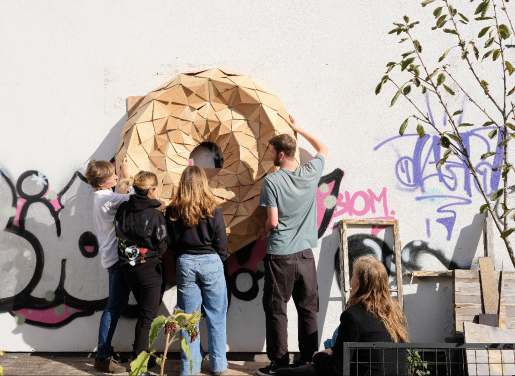 The prototype is to support biodiversity of insects thanks to the responsive wood and is accompanied by a pollinator garden thanks to the seed bombing event.